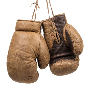Vintage boxing gloves hanging from laces