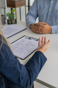 Asian businesswoman giving interview to human resource