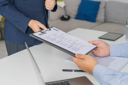Asian businesswoman sent resume for apply for work