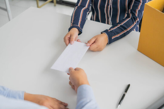 Asian businesswoman sent a letter of resignation to human resources
