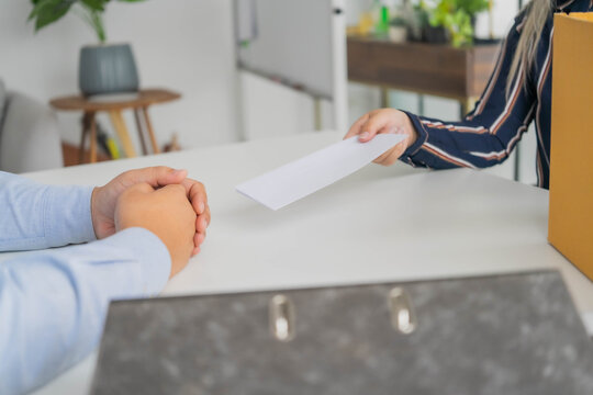 Asian businesswoman sent a letter of resignation to human resources
