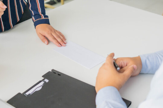 Asian businesswoman sent a letter of resignation to human resources