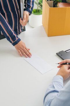 Asian businesswoman sent a letter of resignation to human resources