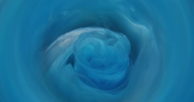 Fume blend. Defocused ink. Glitter blue yellow circle haze rotation stream frame. Color vapor spiral water flow abstract background.