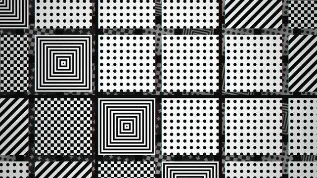 Geometric black and white grid tiles scrolling seamless loop