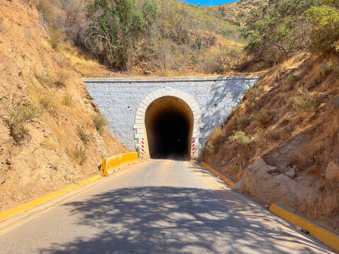 stone archway tunnel hillside Chile