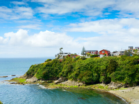 Wooden houses beach Ancud, Chile