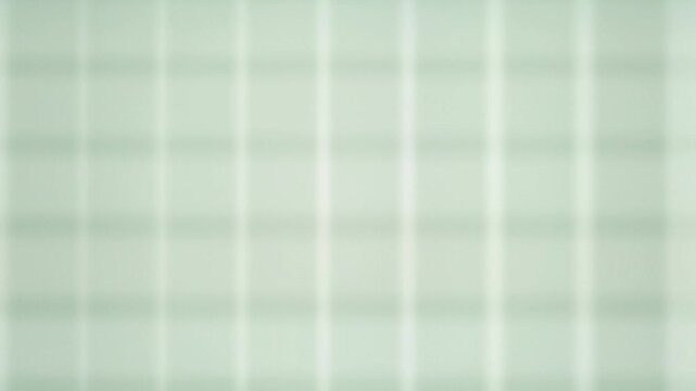 Light sage green check plaid pattern seamless loop motion background
