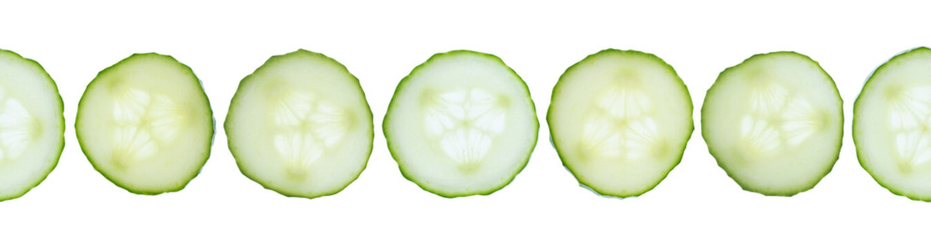 Seamless border of fresh cucumber slices isolated on transparent background no shadow with clipping path and full depth of field