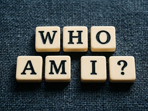 Who Am I Question Spelled with Letter Tiles for Self Discovery Concept