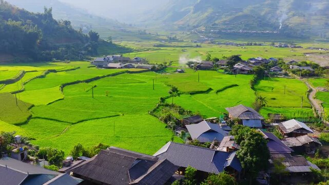 Aerial view of golden rice terraces at Khau Pha pass, near Mu Cang Chai town and Sapa city, Vietnam.