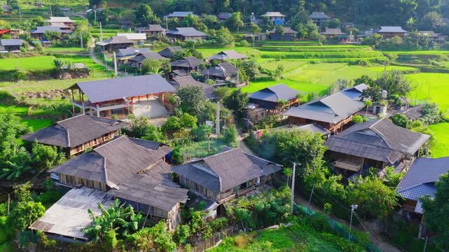 Aerial view of golden rice terraces at Khau Pha pass, near Mu Cang Chai town and Sapa city, Vietnam.