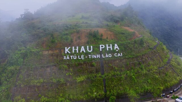 Aerial view of golden rice terraces at Khau Pha pass, near Mu Cang Chai town and Sapa city, Vietnam.