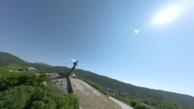 Zagorisia Woman, Dynamic aerial FPV flight arround Woman Statue Monument of Zagori, Fluid motion and Dramatic angle footage of war memorial in Epirus Greece