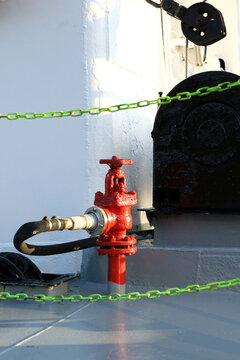 red marine fire hydrant with pipe