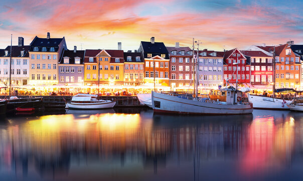 Copenhagen Nyhavn, New port of Copenhagen, sunset in Denmark