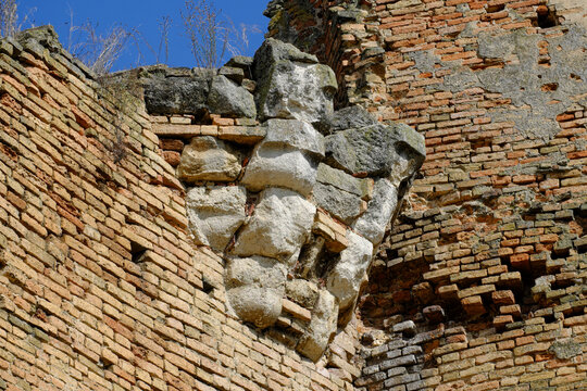 ruined architectural detail of a stone corbel in the walls of Bac Fortress, Vojvodina, Serbia