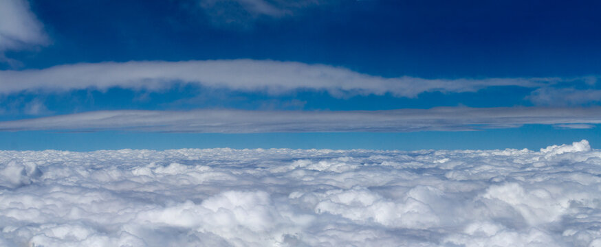 Beautiful panoramic view from above the clouds
