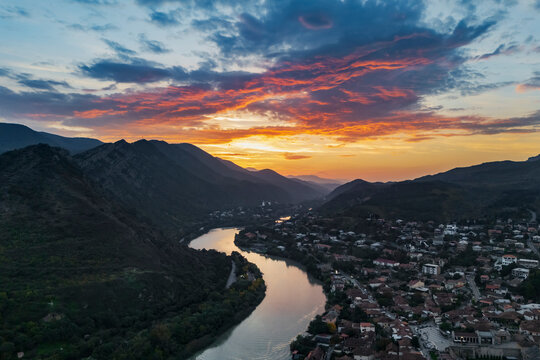 Mtskheta City and Mtkvari (Kura) River flowing at Sunset in Georgia