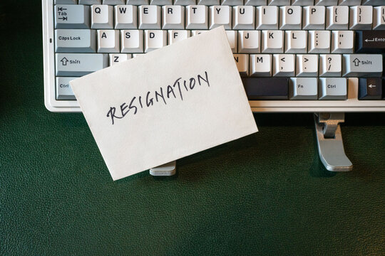 Resignation letter on top of keyboard