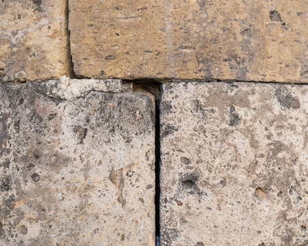 Weathered Ancient Stone Blocks Showing Historical Strength and Resilience