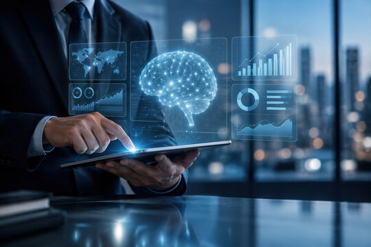 Businessman using tablet with glowing neural brain interface and analytics dashboard in corporate office demonstrating artificial intelligence AI data visualization insights for enterprise