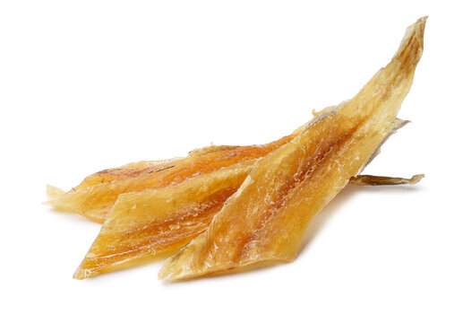 Dried fish close-up on a white. Isolated