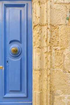 Blue Wooden Door and Brass Door Knocker Detail, Vintage Painted Wood Panels, Historic Limestone Wall