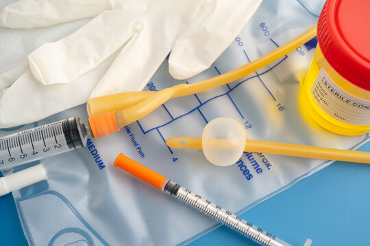 Foley catheter and urine drainage bag collect urine for disability or patient in hospital.