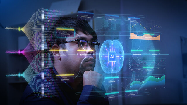 Asian businessman analyzing artificial intelligence interface data with focus and intellectual engagement	