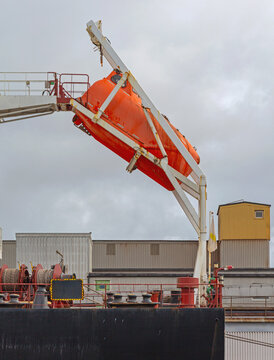 Free Fall Lifeboat Mounted on Stern Ramp Launcher Ship Moored at Cargo Port in Fredrikstad Norway