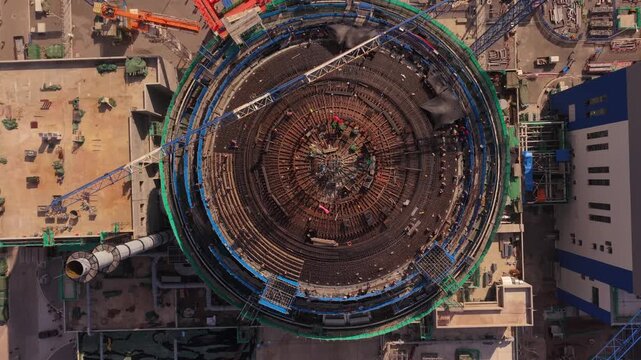 Aerial View of Nuclear Reactor Construction Site with Circular Reinforced Steel Structure