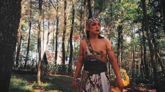Javanese Male Dancer as a Warrior Archer in the Forest