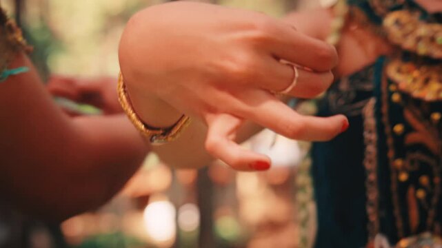 Detail Shot of Javanese Dancers' Hands and Costumes