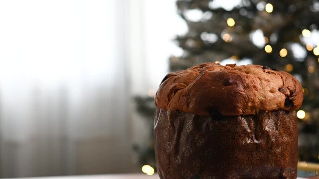 Traditional Italian panettone Christmas cake rotating. Classic festive dessert popular during Christmas and holiday celebrations.