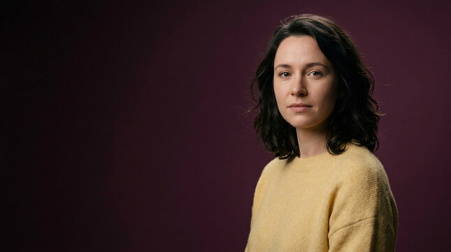 Captivating gaze of a young woman, silently advocating for enhanced Mental Health awareness, fostering open dialogue and robust support networks for all