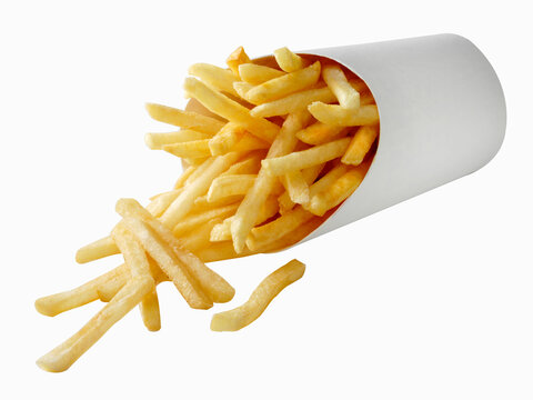 French fries spilling from white fast food container