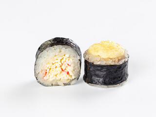 Baked sushi roll and maki roll with white rice and nori on white background Japanese cuisine dish © Andrei Starostin