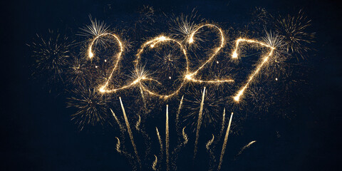 Obraz na płótnie Canvas happy new year, new year's eve, silvester, new years eve, sparklers celebration greeting card, new year card - Year 2027 in sparkler font and firework fireworks pyrotechnic, blue night sky background