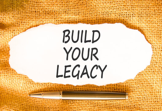 Build your legacy words symbol. Concept words Build your legacy on beautiful white paper. Beautiful canvas background. Black pen. Business build your legacy concept. Copy space.