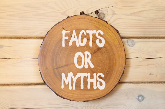 Facts or myths words symbol. Concept words Myths or Facts on beautiful wooden circle. Beautiful wooden wall background. Business and facts or myths concept. Copy space.