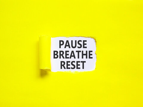 Pause breathe reset words symbol. Concept words Pause breathe reset on beautiful white paper. Beautiful yellow background. Business support motivational and pause breathe reset concept. Copy space.