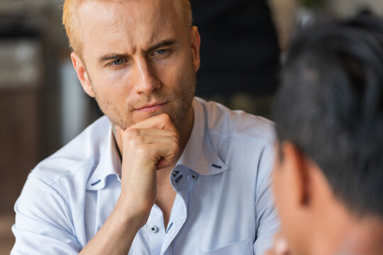 Tired man despair sadness problems. Recession Stress man work hard headache depressed from failure business burnout. Failure businessman stress bankruptcy man sitting feeling nagative depression