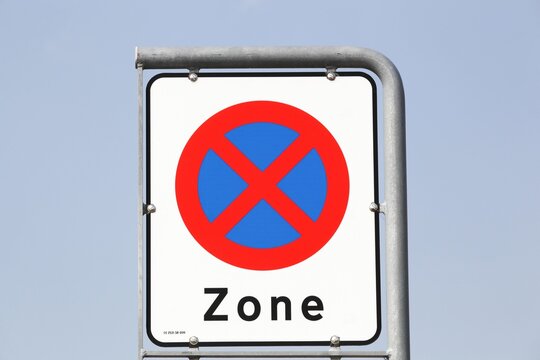 No stopping or parking zone road sign