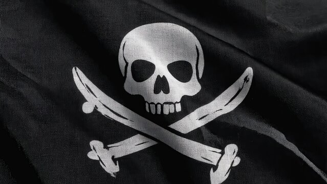 Pirate Flag with Skull and Crossbones on Wooden Deck - Stock Photo