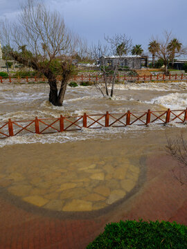 Muddy river overflowing after heavy autumn rainfall