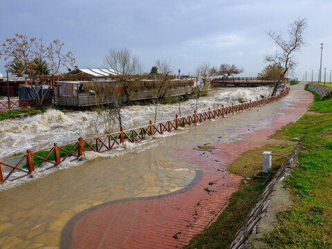 Muddy river overflowing after heavy autumn rainfall