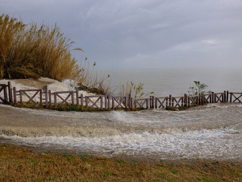 Muddy river overflowing after heavy autumn rainfall