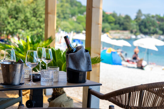 drinking wine on the beach with seaview in Croatia Medveja