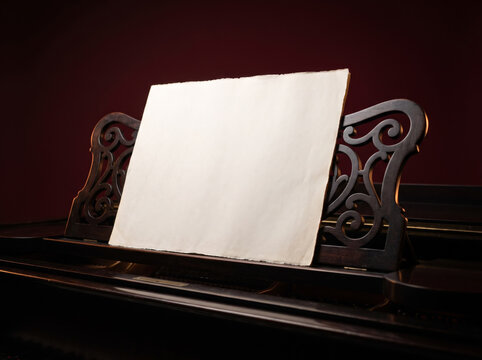 Blank Music Sheet Book On Ornate Piano Stand